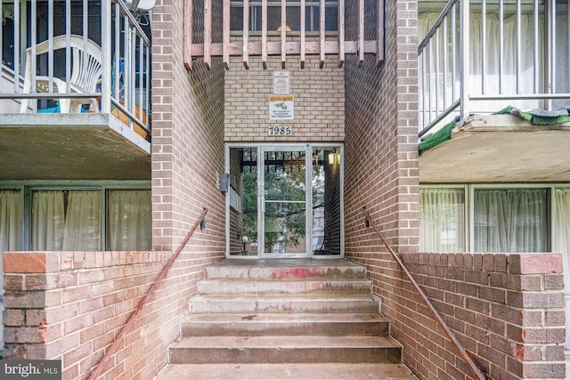 7985 Riggs Rd Unit 5, Hyattsville, MD 20783 - doorway to property featuring brick siding