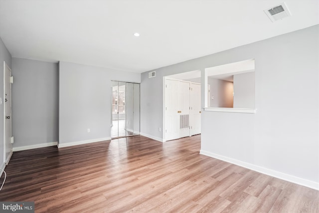 7985 Riggs Rd Unit 5, Hyattsville, MD 20783 - empty room with wood finished floors and recessed lighting
