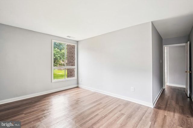 7985 Riggs Rd Unit 5, Hyattsville, MD 20783 - empty room with wood finished floors and baseboards