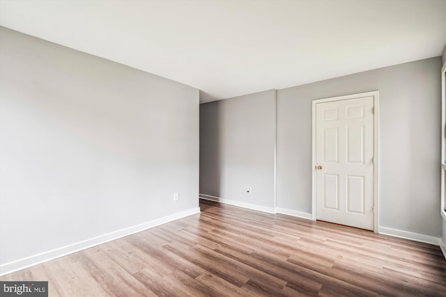 7985 Riggs Rd Unit 5, Hyattsville, MD 20783 - spare room with wood finished floors and baseboards