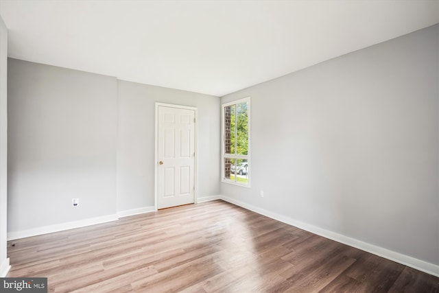 7985 Riggs Rd Unit 5, Hyattsville, MD 20783 - unfurnished room with light wood-type flooring and baseboards