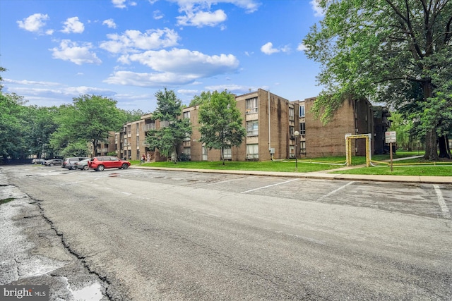 7985 Riggs Rd Unit 5, Hyattsville, MD 20783 - view of apartment building / complex featuring uncovered parking