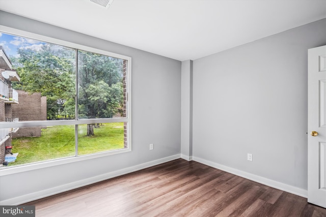 7985 Riggs Rd Unit 5, Hyattsville, MD 20783 - unfurnished room with wood finished floors and baseboards