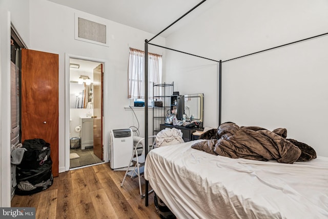 1917 Spring Garden St, Philadelphia, PA 19130 - bedroom with wood finished floors and connected bathroom
