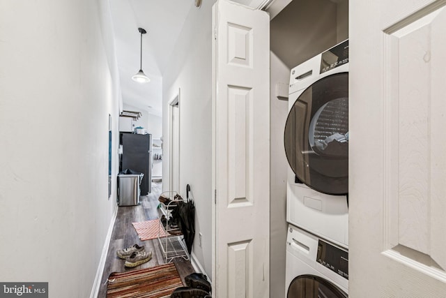1917 Spring Garden St, Philadelphia, PA 19130 - laundry area with estacked washer and dryer and wood finished floors