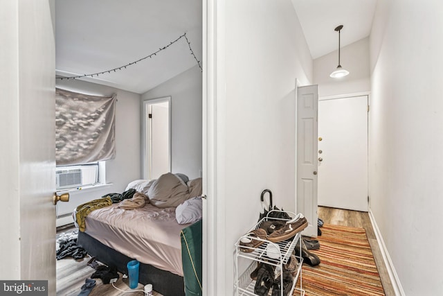 1917 Spring Garden St, Philadelphia, PA 19130 - corridor featuring lofted ceiling, baseboard heating, wood finished floors, and cooling unit