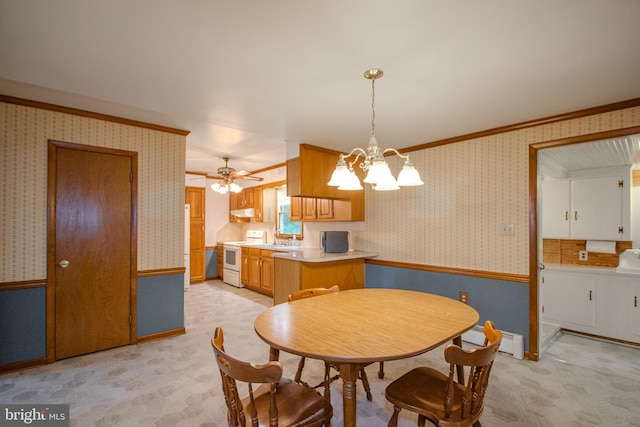24981 Delmar Rd, Mardela Springs, MD 21837 - dining area with wallpapered walls, baseboard heating, a wainscoted wall, ornamental molding, and ceiling fan
