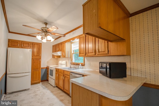 24981 Delmar Rd, Mardela Springs, MD 21837 - kitchen with white appliances, crown molding, under cabinet range hood, light countertops, and a peninsula