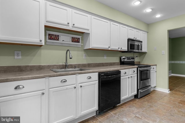 2109 Sturbridge Cmn, Holland, PA 18966 - kitchen with stainless steel appliances, white cabinetry, recessed lighting, and open shelves