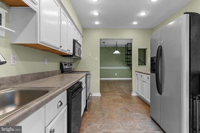 2109 Sturbridge Cmn, Holland, PA 18966 - kitchen featuring stainless steel appliances, white cabinets, recessed lighting, open shelves, and decorative light fixtures