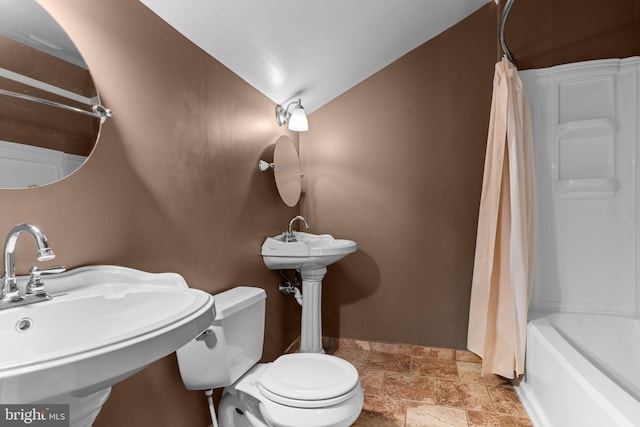 2109 Sturbridge Cmn, Holland, PA 18966 - bathroom with stone tile floors and shower / tub combo with curtain