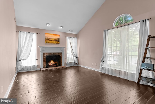 2109 Sturbridge Cmn, Holland, PA 18966 - unfurnished living room featuring vaulted ceiling, wood finished floors, and a fireplace