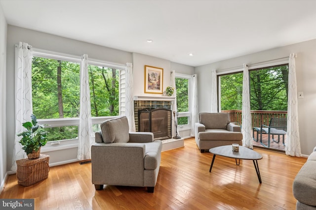 705 Westtown Cir Unit 705, West Chester, PA 19382 - living room with a glass covered fireplace, wood finished floors, and recessed lighting