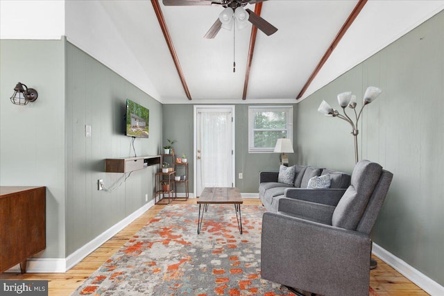 132 Erie Trl, Winchester, VA 22602 - living area with wood finished floors, ceiling fan, and wood walls