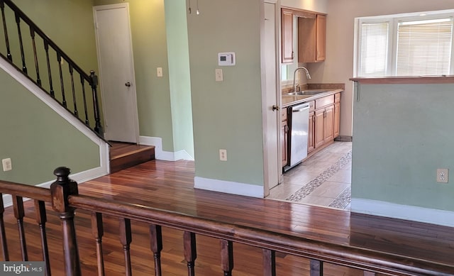 140 Joyceton Ter, Upper Marlboro, MD 20774 - kitchen with dishwasher, inlaid floor details, and light wood finished floors