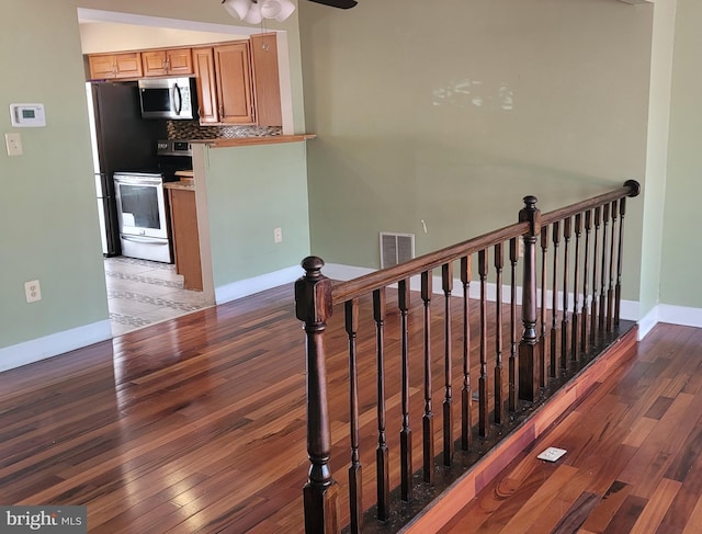 140 Joyceton Ter, Upper Marlboro, MD 20774 - staircase with wood finished floors and ceiling fan