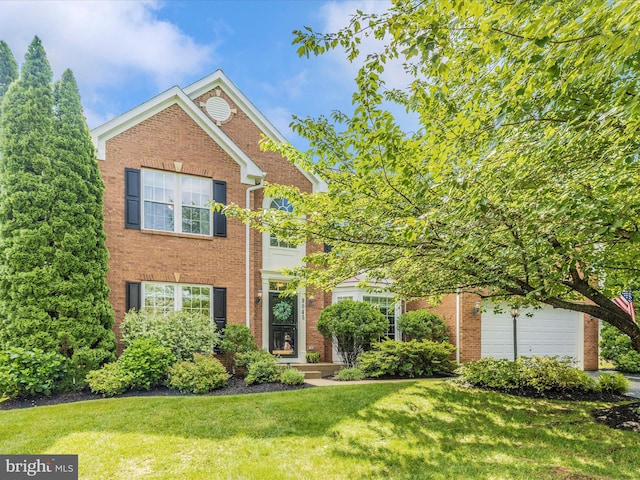 9045 Clendenin Way, Frederick, MD 21704 - view of front of house featuring brick siding and a front yard