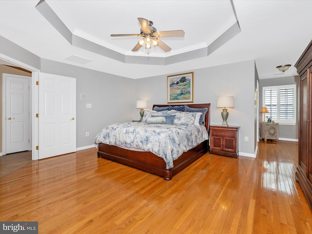 9045 Clendenin Way, Frederick, MD 21704 - bedroom with a tray ceiling, light wood finished floors, crown molding, and ceiling fan