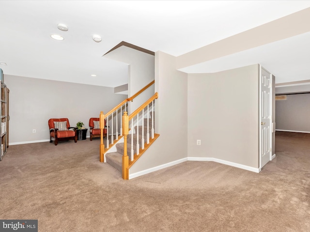 9045 Clendenin Way, Frederick, MD 21704 - living area with carpet flooring, stairway, and recessed lighting