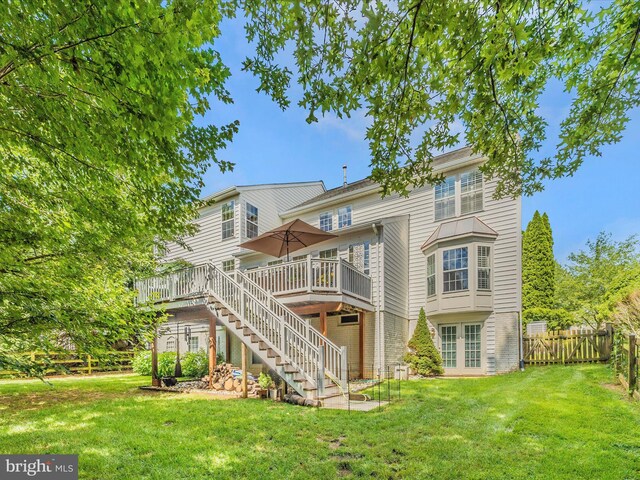 9045 Clendenin Way, Frederick, MD 21704 - back of property featuring stairway, a deck, and brick siding