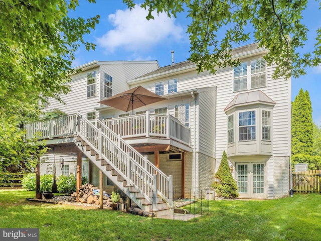 9045 Clendenin Way, Frederick, MD 21704 - rear view of property featuring a wooden deck, stairway, and brick siding