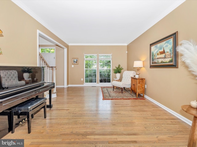 9045 Clendenin Way, Frederick, MD 21704 - living area featuring ornamental molding, light wood-type flooring, and stairs