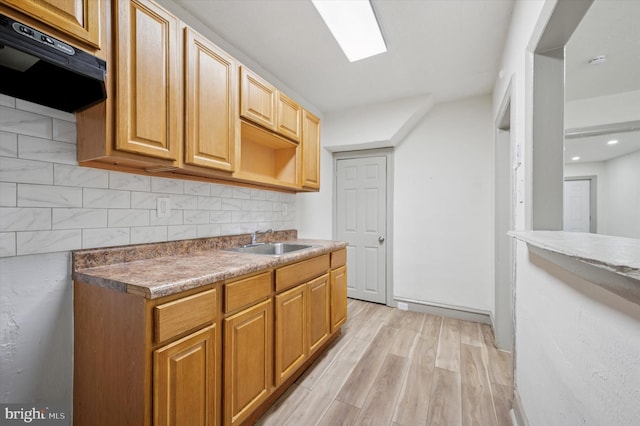 5852 Crittenden St, Philadelphia, PA 19138 - kitchen with exhaust hood, light wood-style floors, backsplash, and recessed lighting