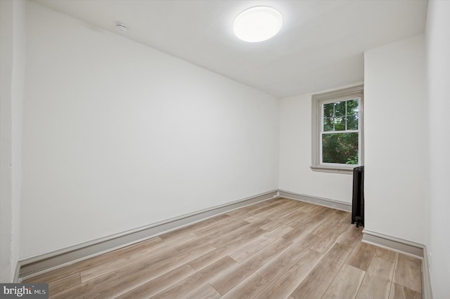 5852 Crittenden St, Philadelphia, PA 19138 - empty room featuring light wood-style flooring and a smoke detector