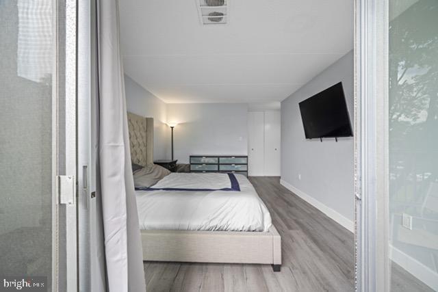 401 Cooper Landing Rd Unit 225, Cherry Hill, NJ 08002 - bedroom featuring wood finished floors and baseboards