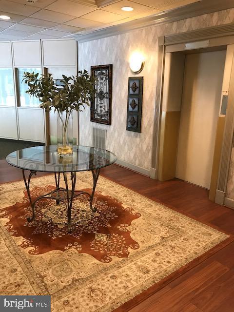 401 Cooper Landing Rd Unit 225, Cherry Hill, NJ 08002 - corridor featuring wood finished floors, recessed lighting, and elevator