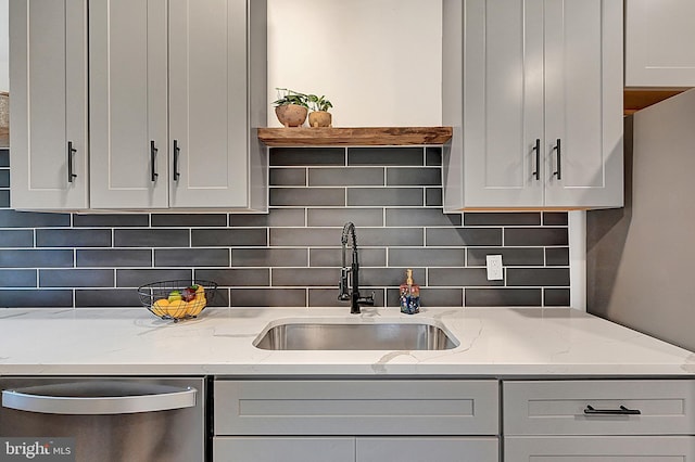 528 N St, Lancaster, PA 17602 - kitchen featuring dishwasher, backsplash, and light stone countertops