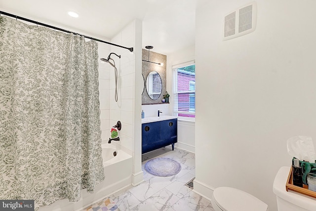 528 N St, Lancaster, PA 17602 - bathroom featuring shower / bath combo, marble finish floors, and vanity