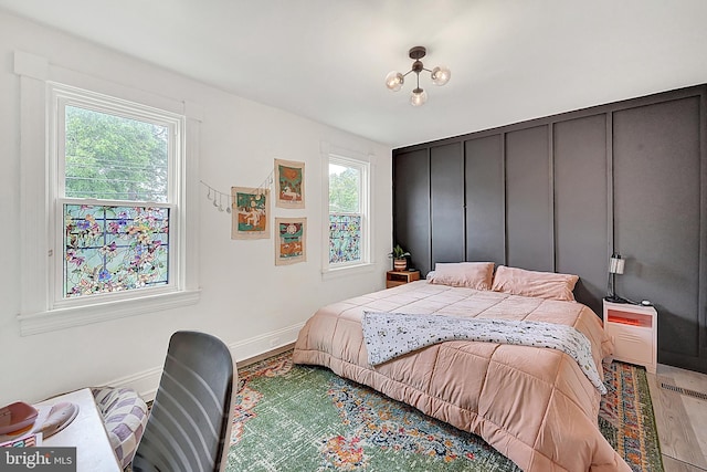 528 N St, Lancaster, PA 17602 - bedroom with multiple windows and wood finished floors