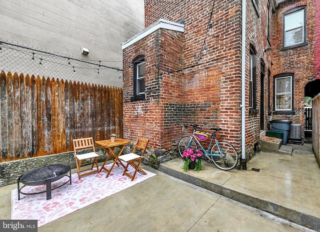 528 N St, Lancaster, PA 17602 - view of patio featuring a fire pit