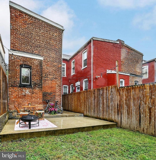 528 N St, Lancaster, PA 17602 - rear view of property with brick siding and a patio area