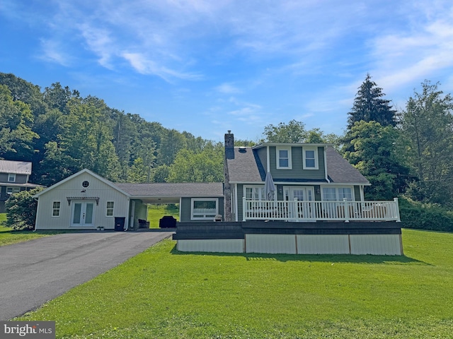 680 Myers Rd, Muncy Valley, PA 17758 - view of front of house featuring french doors, a front yard, driveway, a chimney, and a wooden deck