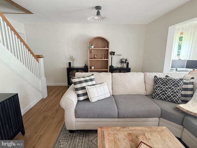 680 Myers Rd, Muncy Valley, PA 17758 - living area featuring wood finished floors, stairway, and ceiling fan