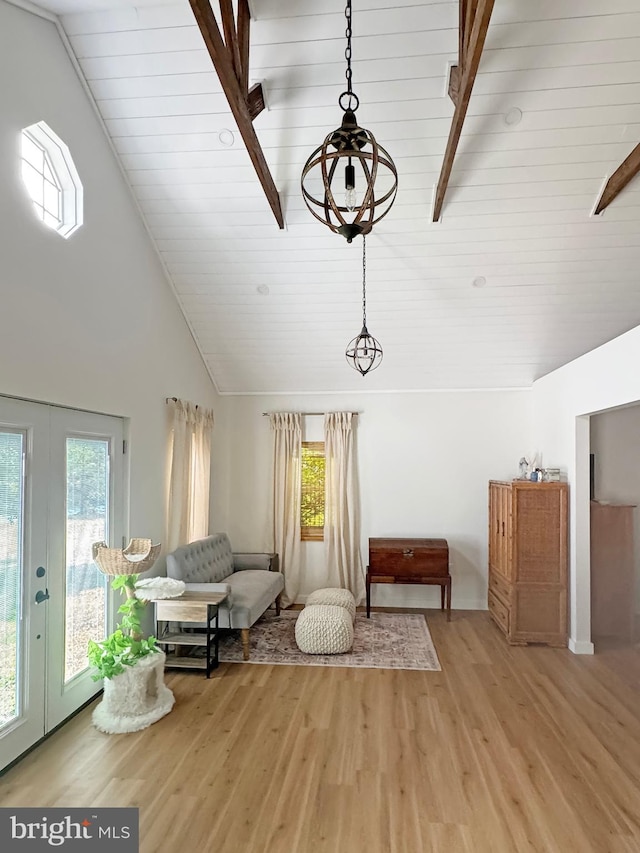 680 Myers Rd, Muncy Valley, PA 17758 - sitting room with healthy amount of natural light, light wood finished floors, french doors, and high vaulted ceiling