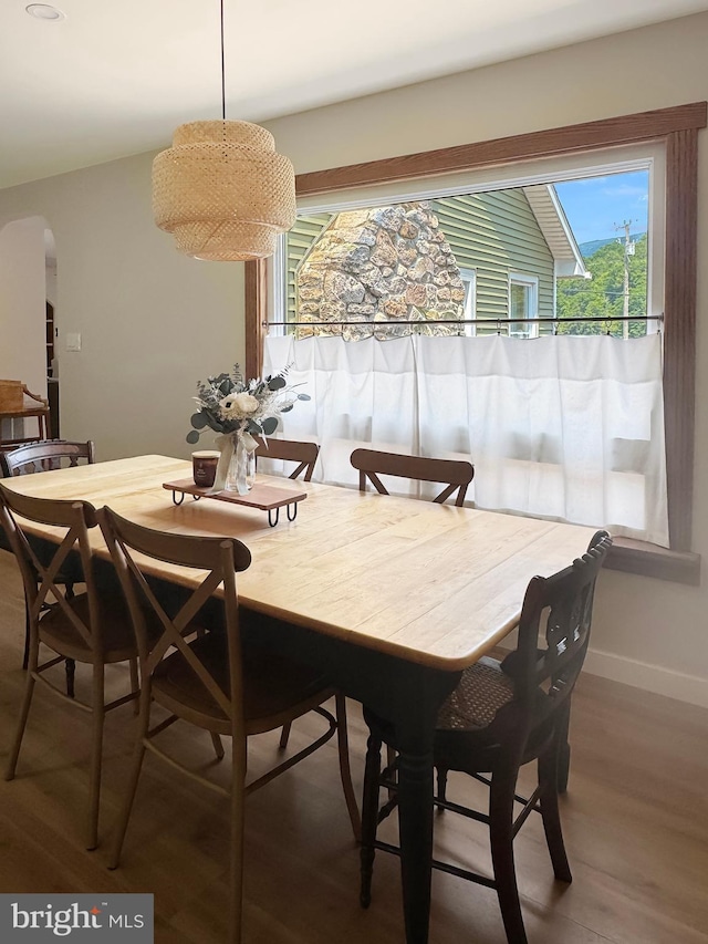 680 Myers Rd, Muncy Valley, PA 17758 - dining space featuring arched walkways and wood finished floors