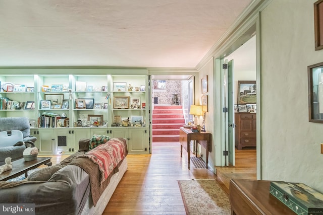 2622 Butler Pike, Plymouth Meeting, PA 19462 - living room with hardwood / wood-style flooring, stairs, ornamental molding, and a textured wall