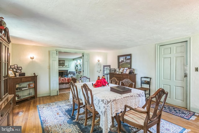 2622 Butler Pike, Plymouth Meeting, PA 19462 - dining space featuring hardwood / wood-style flooring and a textured ceiling