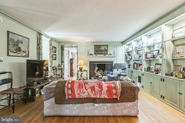 2622 Butler Pike, Plymouth Meeting, PA 19462 - living room with a fireplace, ornamental molding, and wood finished floors