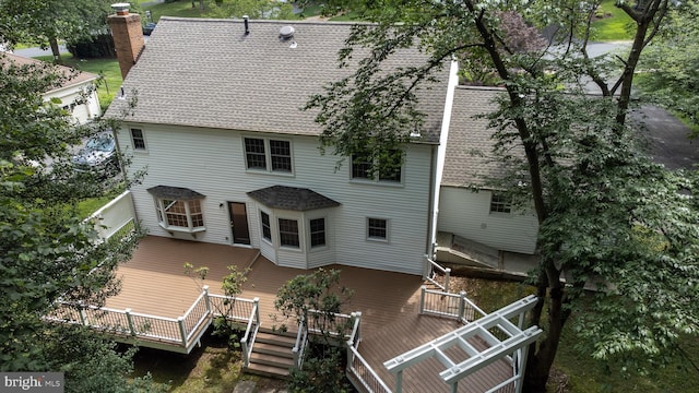 9708 S Park Cir, Fairfax Station, VA 22039 - back of house with a chimney, a shingled roof, and a deck