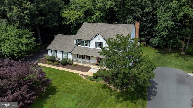 9708 S Park Cir, Fairfax Station, VA 22039 - view of front of property with a front yard, a chimney, asphalt driveway, and roof with shingles