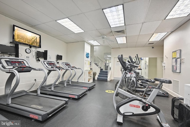 4201 Cathedral Ave NW Unit 122E, Washington, DC 20016 - gym with ceiling fan and a paneled ceiling