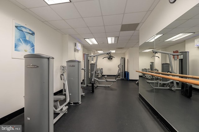 4201 Cathedral Ave NW Unit 122E, Washington, DC 20016 - exercise room with a drop ceiling and baseboards