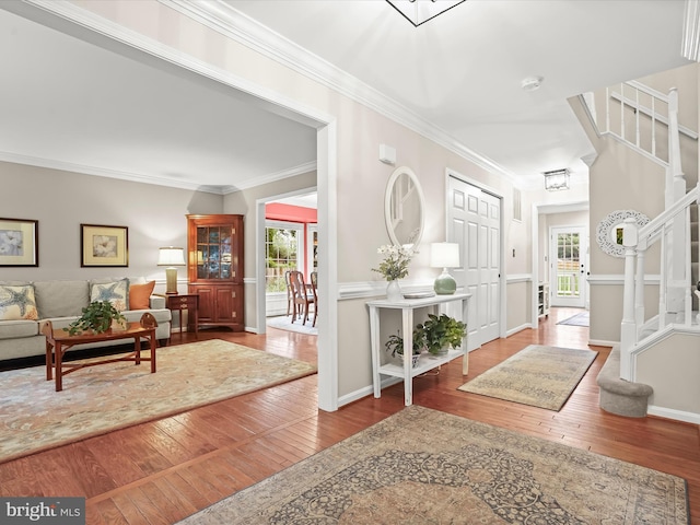 10267 Cedar Ridge Dr, Manassas, VA 20110 - entrance foyer featuring wood-type flooring, stairway, healthy amount of natural light, and ornamental molding
