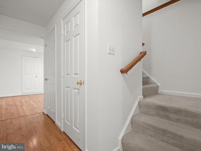 10267 Cedar Ridge Dr, Manassas, VA 20110 - stairs with wood finished floors and baseboards