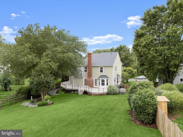 10267 Cedar Ridge Dr, Manassas, VA 20110 - rear view of property with a wooden deck and a chimney