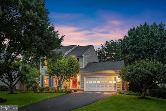 10267 Cedar Ridge Dr, Manassas, VA 20110 - view of front of house featuring a garage, asphalt driveway, and a front lawn
